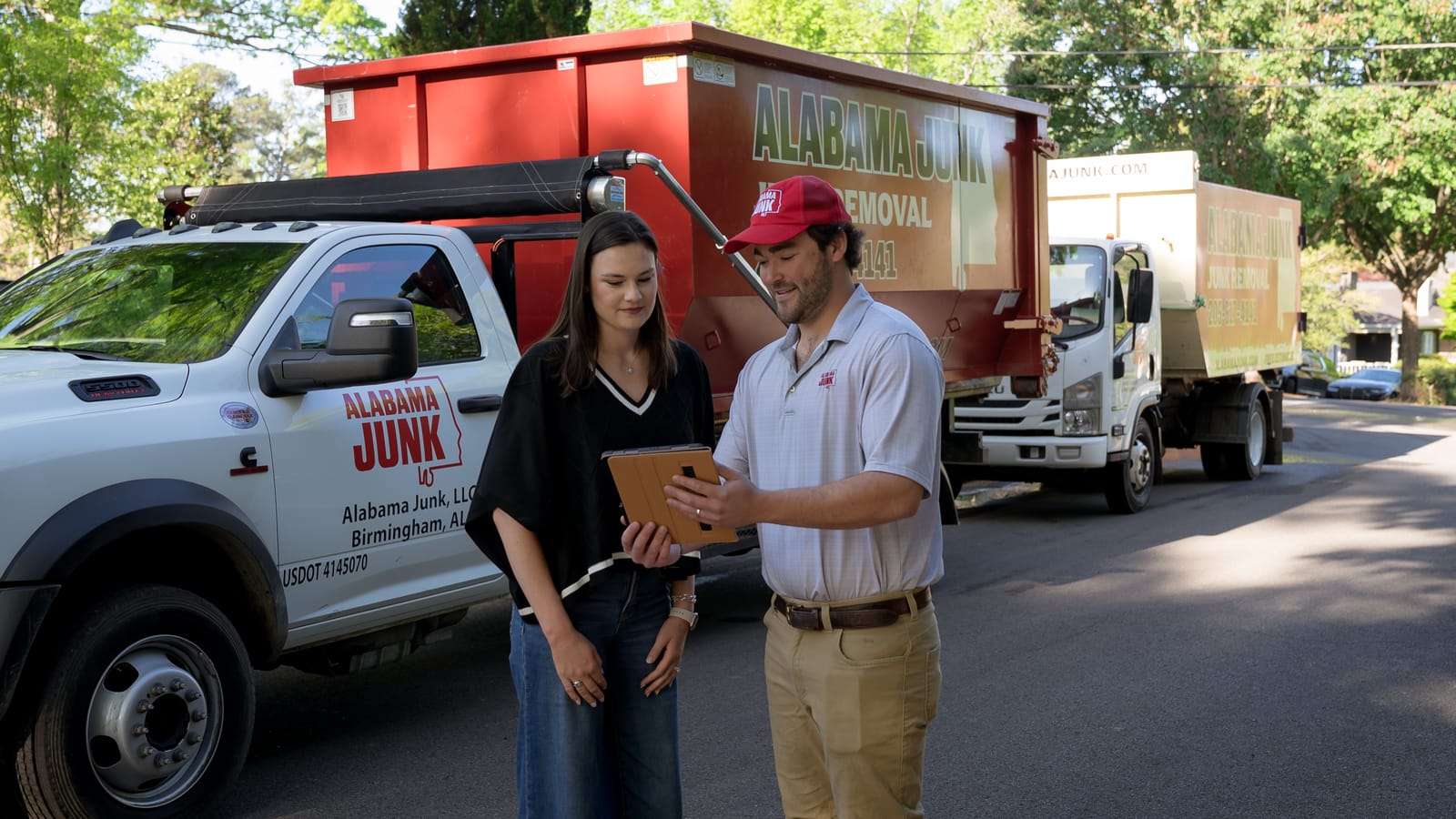 Alabama Junk Removal crew walking a job with a customer in Birmingham